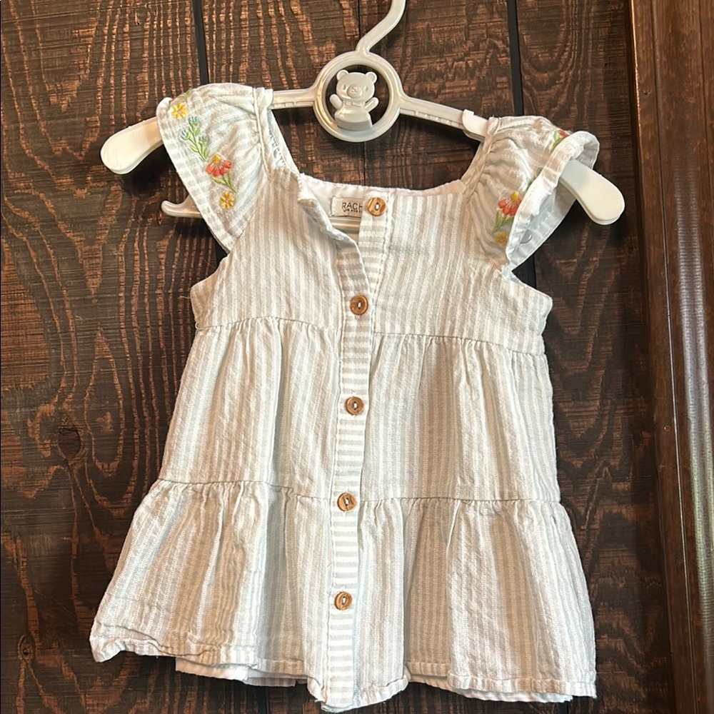 Sage White Blouse with Ruffled Sleeves and Tiered Design